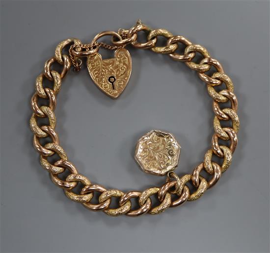 A 9ct gold curb-link bracelet, padlock clasp and locket attached, gross 17.5 grams.